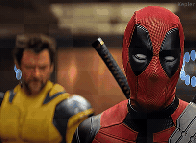 Deadpool Holding Sword In Front Of Yellow Suit Man GIF