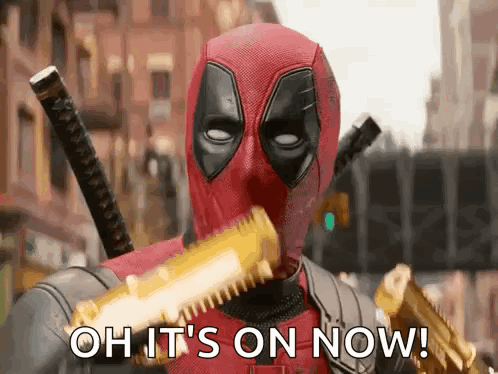 Deadpool Is Holding A Gun And Saying `` Oh It 'S On Now '' . GIF
