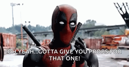 Deadpool Is Holding Two Guns And Saying `` Oh Yeah ... Gotta Give You Props For That One '' . GIF