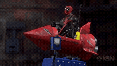 Deadpool Is Riding A Red Rocket With Ign Written On The Bottom GIF