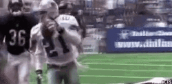 Deion Sanders Football Run GIF