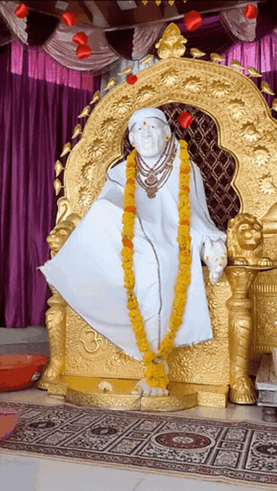 Deity Sitting On Gold Chair GIF