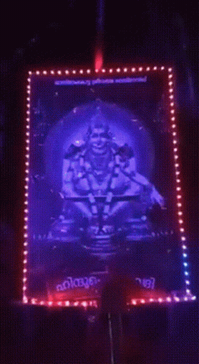 Deity Surrounded By Blue And Red Lights Kerala GIF