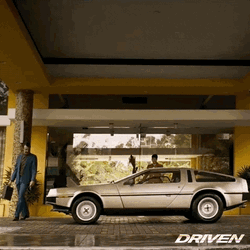 Delorean Parked In Front Of Building GIF