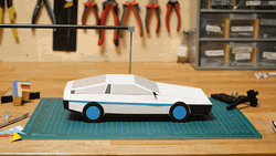 Delorean Toy Car Tied To String GIF