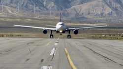 Delta Airlines Flying Above Blue Sky GIF