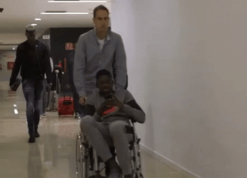Dembele On A Wheel Chair GIF