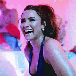 Demi Lovato Laughing Bubbles Falling GIF