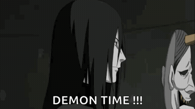 Demon Holding Mask With Horns Saying Demon Time GIF