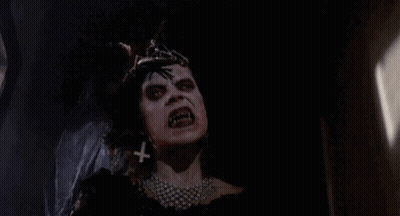 Demon Sitting On Bed Saying Good Night GIF