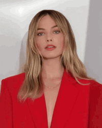 Demure Margot Robbie Red Suit GIF