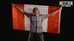Denis Shapovalov Holding The Canadian Flag