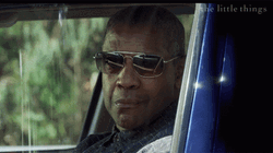 Denzel Washington Awkward Smile In Dark Shades GIF