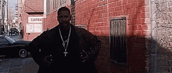 Denzel Washington Hiding Weapons Under Coat GIF