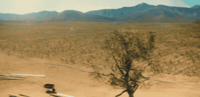 Desert Landscape With Mountains And Tree GIF