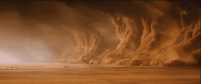 Desert Sandstorm With People In Distance GIF