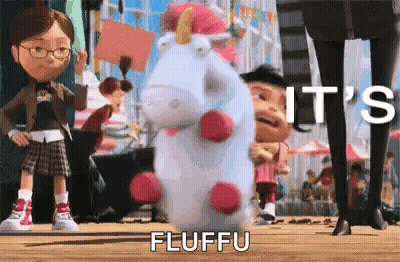 Despicable Me Stuffed Unicorn Standing Next To Girl On Wooden Floor GIF
