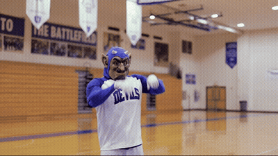 Devils Mascot In Gym With Banners GIF