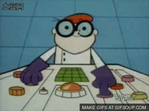 Dexter From Cartoon Network Is Playing A Game On A Table GIF