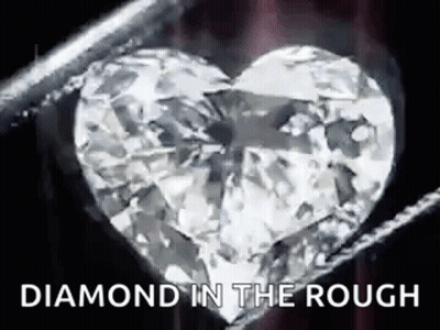 Diamond Heart Held In Tweezers GIF