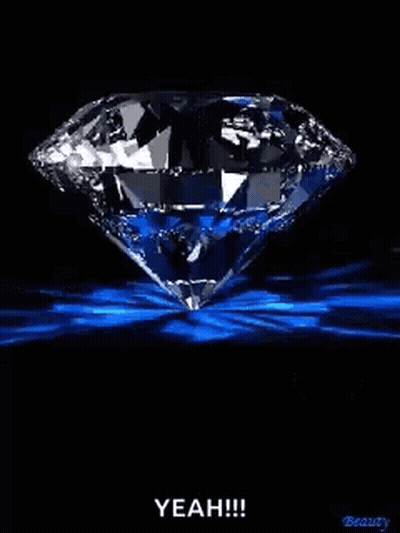 Diamond With Blue Light On Black Background GIF