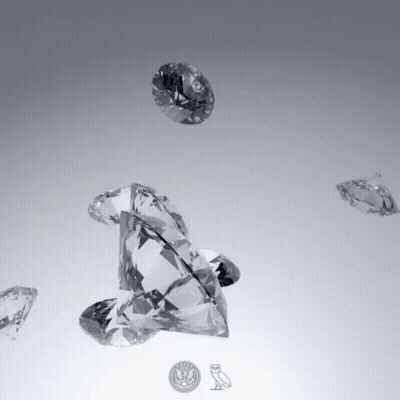 Diamonds On Table With US Coin GIF