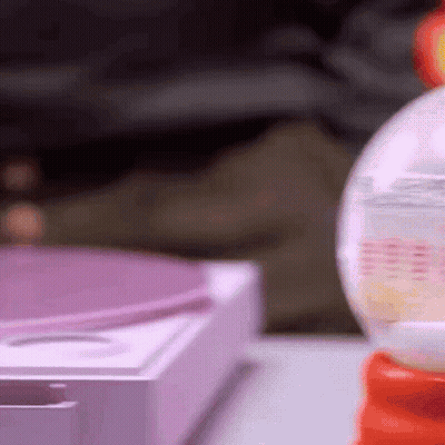 Diet Coke Bottle Next To Record Player GIF