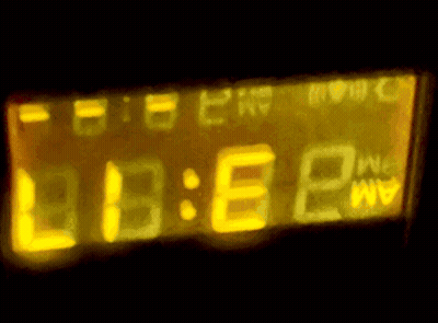 Digital Clock Showing 13:58 GIF