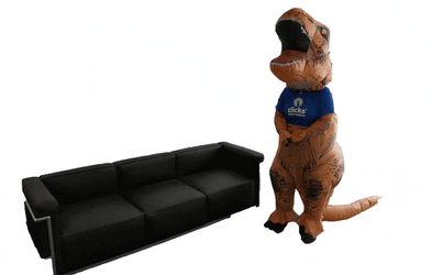 Dinosaur Costume Lying On The Couch GIF