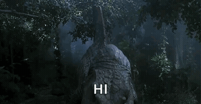 Dinosaur In Forest Saying Hi GIF