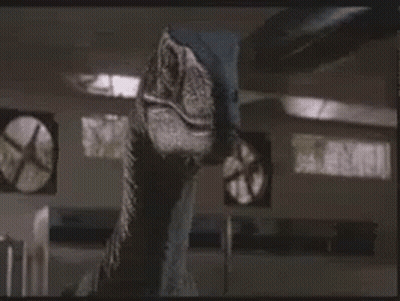 Dinosaur In Room With Fans GIF