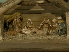 Dinosaur Puppet Ruining Nativity Of Jesus  GIF