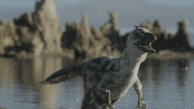 Dinosaur Running With Mouth Open In Water GIF