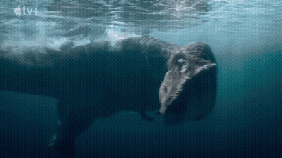 Dinosaur Swimming In Water With Apple TV+ Logo GIF