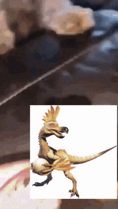Dinosaur With Feathers On Head GIF