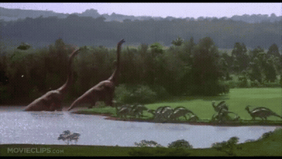 Dinosaurs Swimming In River GIF