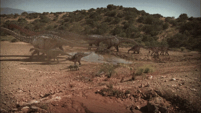 Dinosaurs Walking In Dirt GIF