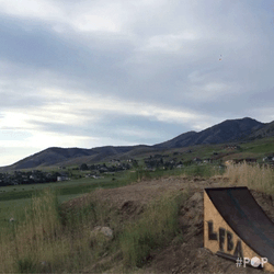 Dirt Bike Vanishing Mid Air Loop GIF
