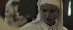 Disappointed Nurse Looking Away GIF