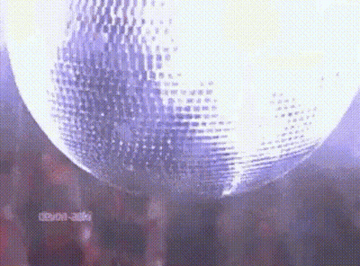 Disco Ball Hanging In Dark Room GIF