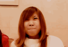 Disgusted Woman With Poop Emojis GIF