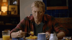 Distracted While Eating Pasta GIF