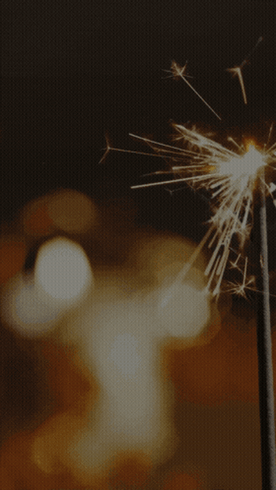 Diwali Greeting Card With Candle And Fireworks GIF