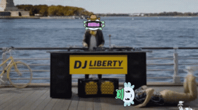 DJ Behind DJ Liberty Sign GIF