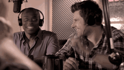 DJs Bradley Cooper And Chapelle Fist Bump GIF