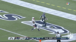 DK Metcalf Taps Ball  GIF