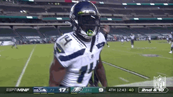 DK Metcalf Throwing Football GIF