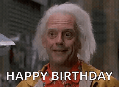 Doc Brown In Yellow Jacket And Red Shirt GIF