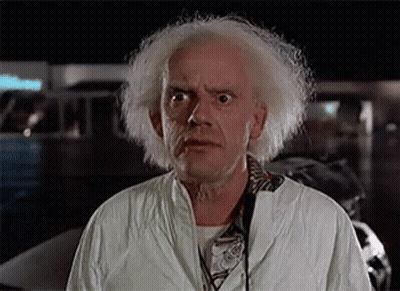 Doc Brown Making Funny Face In Parking Lot GIF