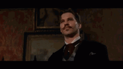 Doc Holliday Juggling Glass GIF